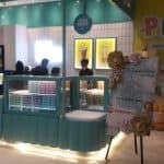 Jasa pembuatan booth pameran komersial F&B Puyo oleh Workshop88 kontraktor Surabaya.